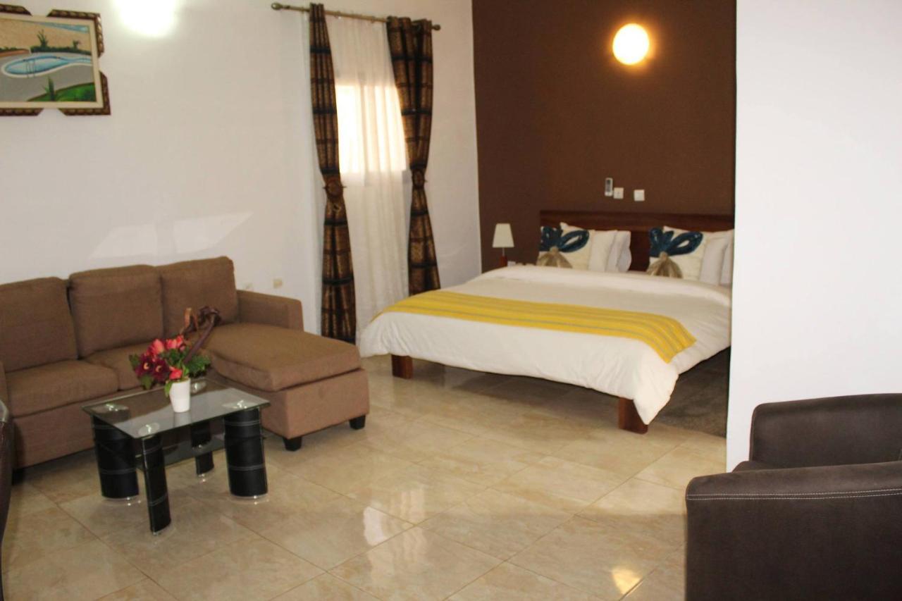 Complexe Hotelier Olympe Korhogo Exteriör bild
